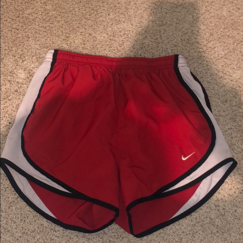Red Nike shorts